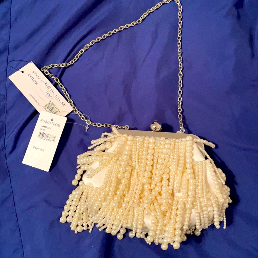NWT Beautiful beaded, with chain evening bag. Never used. Gorgeous.